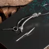 Nash Fluorocarbon D-Rig 6 bez protihrotu, s očkem, předvázaný háček